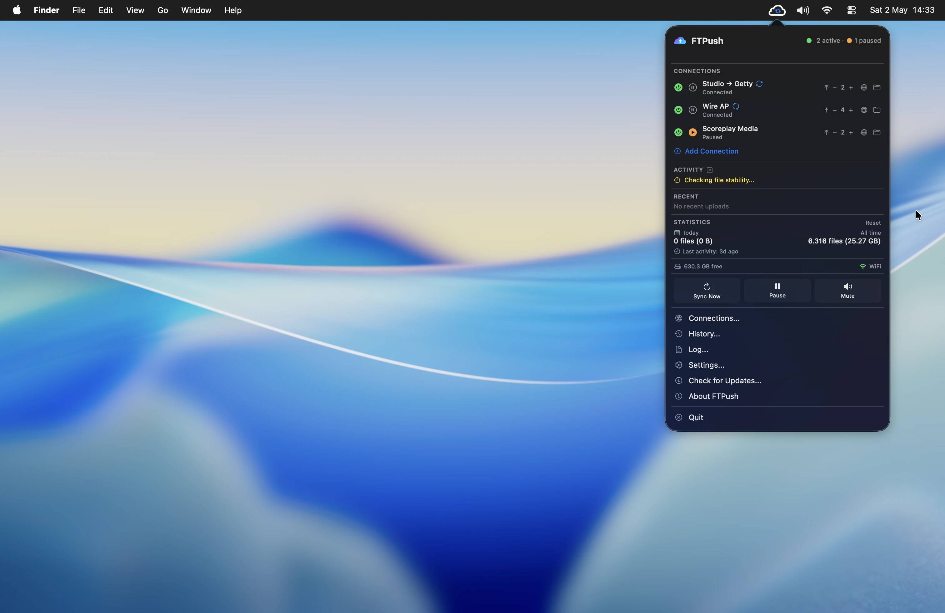 FTPush desktop view showing the menu bar app monitoring FTP upload connections in real time
